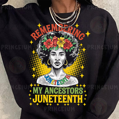 a woman wearing a black sweatshirt with flowers in her hair