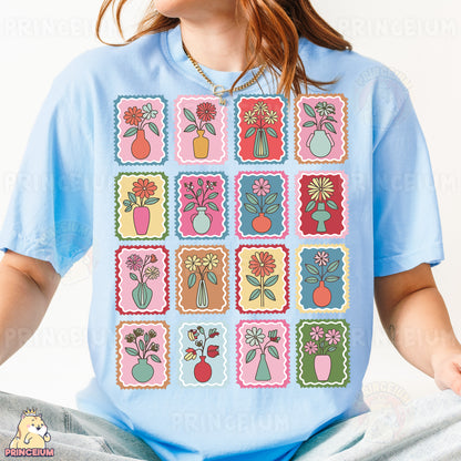 a woman wearing a t - shirt with a bunch of flowers on it