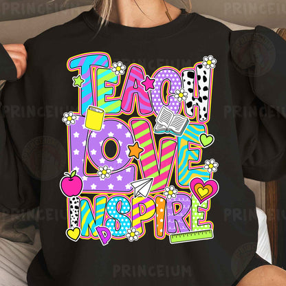 a woman wearing a black t - shirt that says teach love inspire
