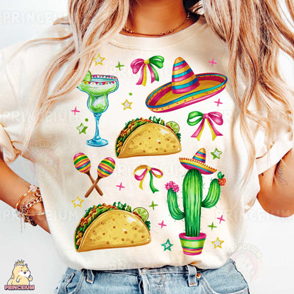a woman wearing a t - shirt with tacos and sombreros on it