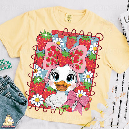 a t - shirt with an image of a duck wearing a bow and strawberries