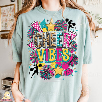 a woman wearing a t - shirt that says cheer vibes