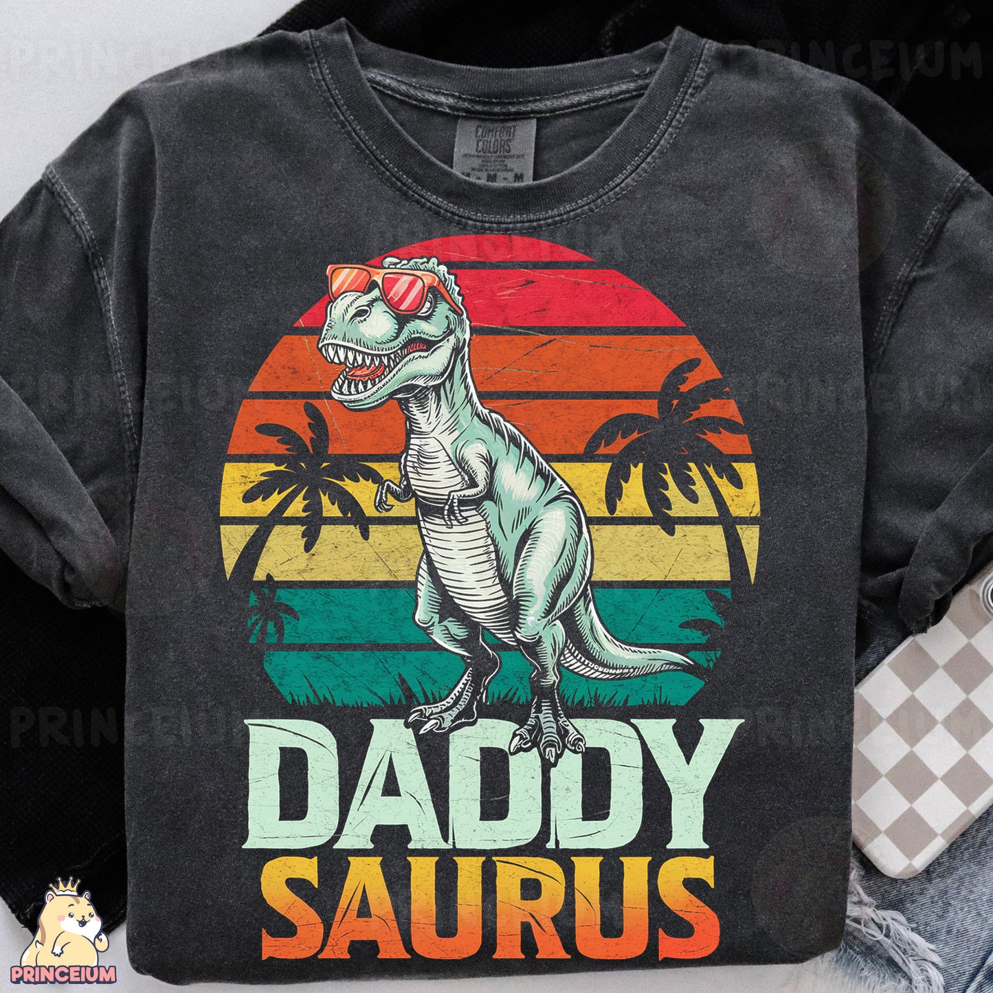 a t - shirt that says daddy saurus with a dinosaur on it