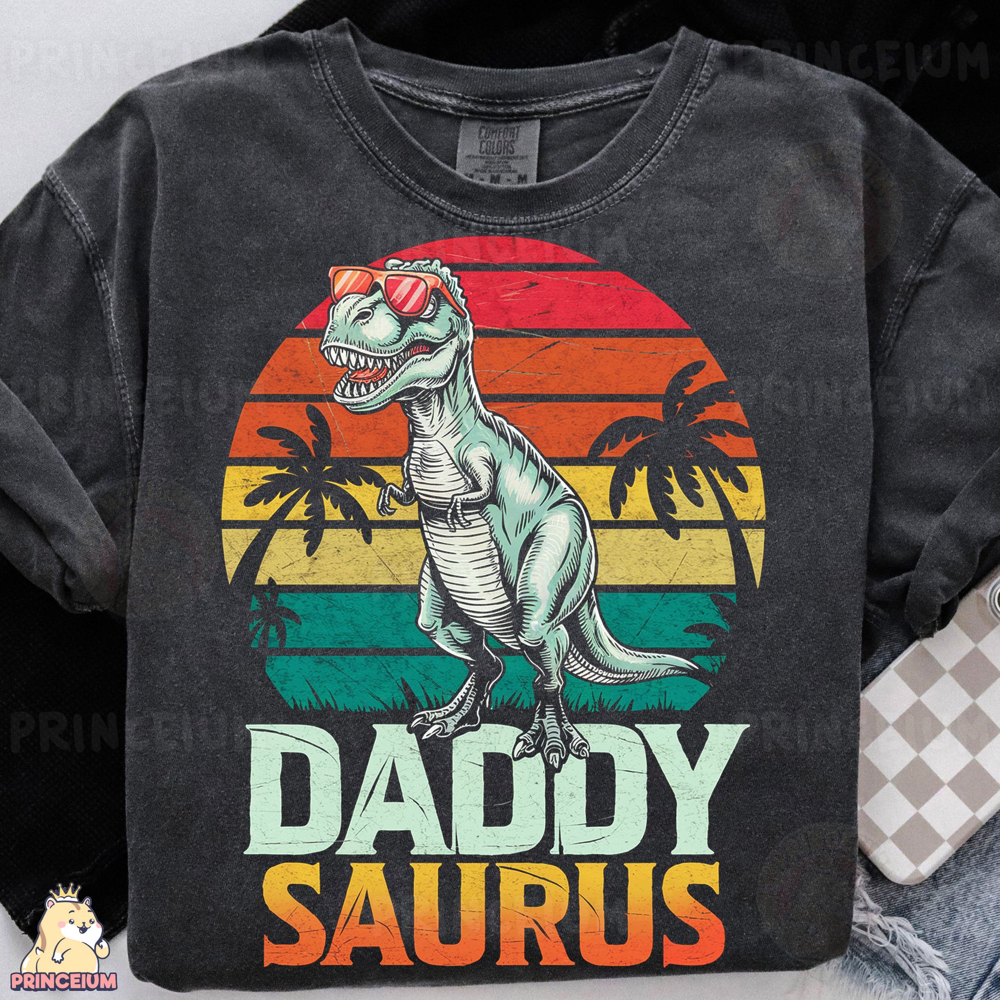 a t - shirt that says daddy saurus with a dinosaur on it