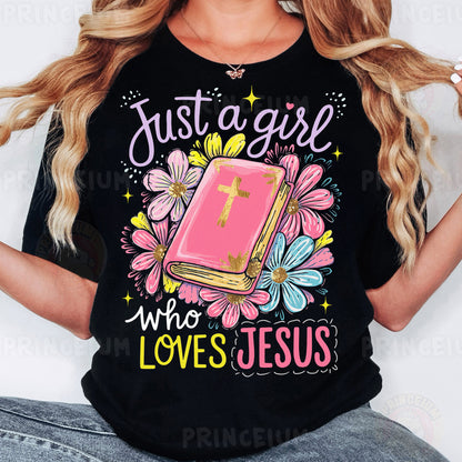 a woman wearing a t - shirt that says just a girl who loves jesus