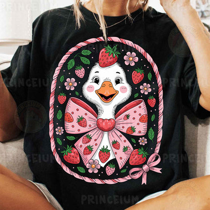 a woman sitting on a couch wearing a t - shirt with a picture of a