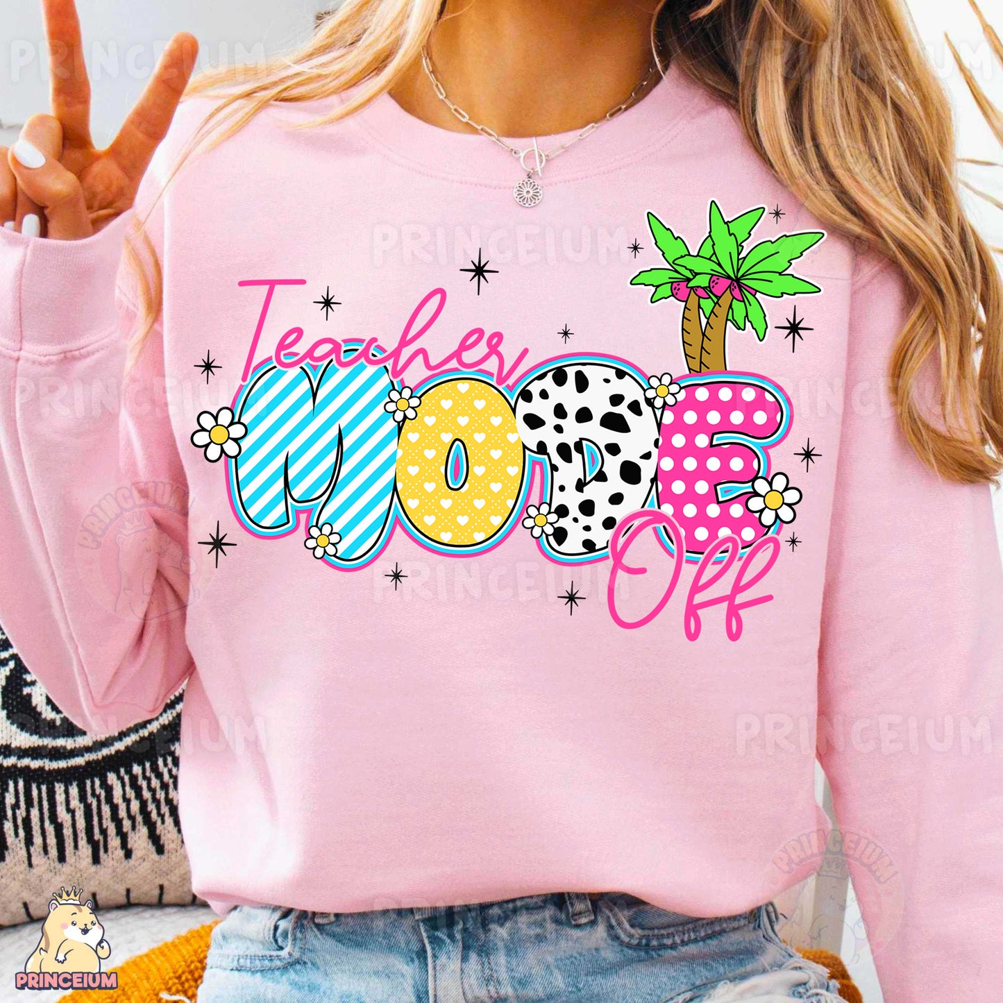 a woman wearing a pink shirt with a palm tree on it