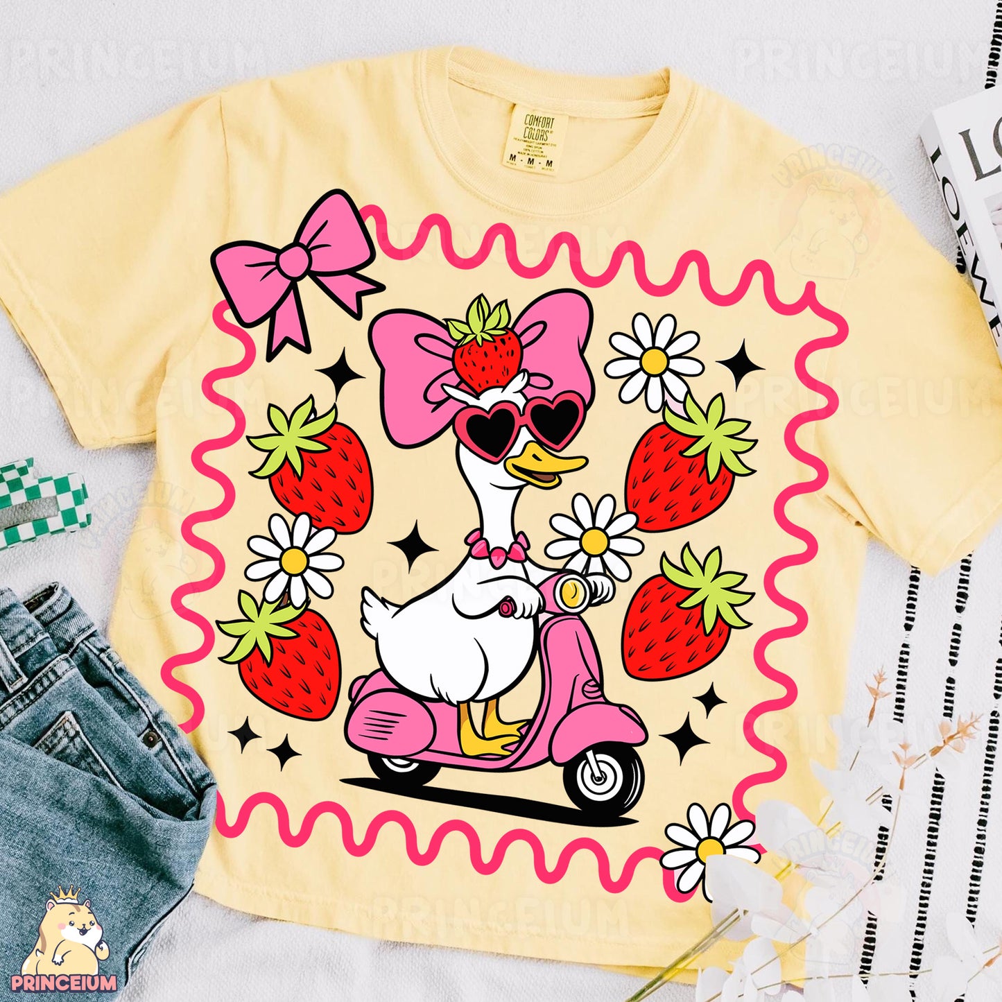 a t - shirt with a picture of a duck riding a scooter