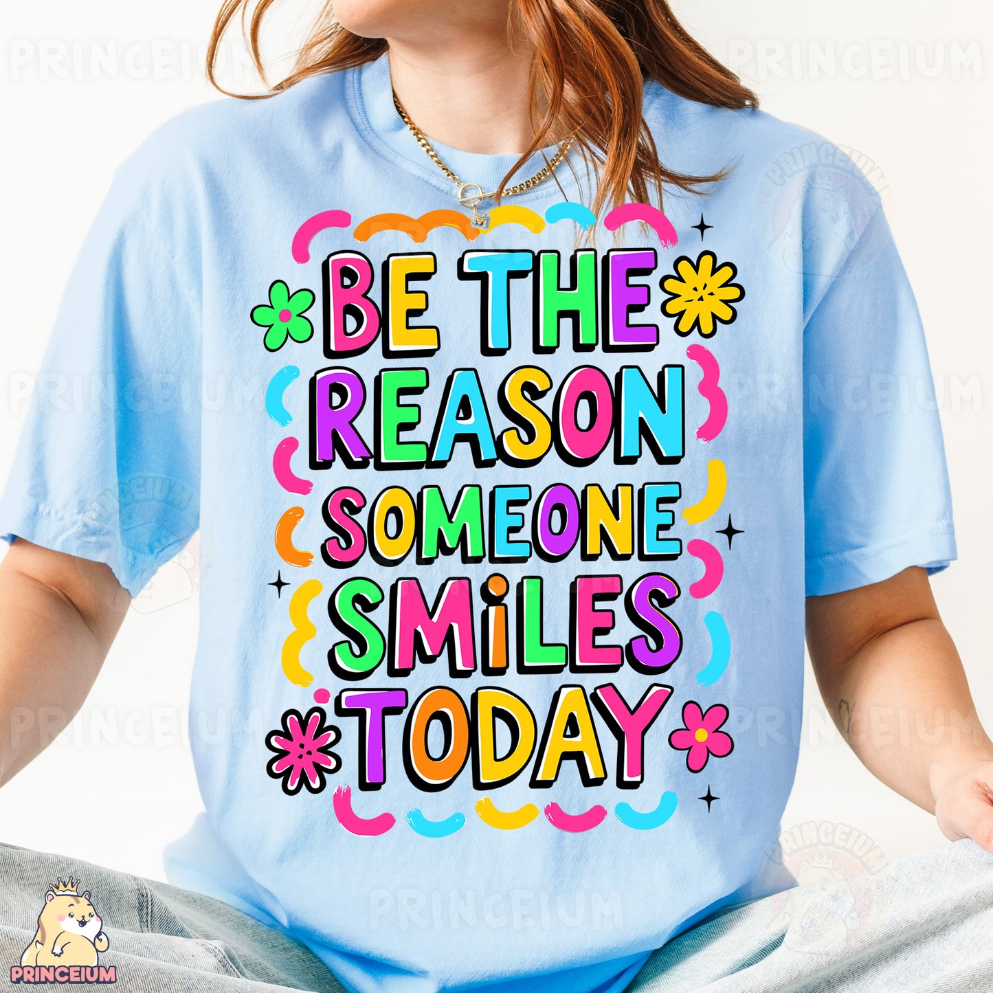 a woman wearing a t - shirt that says be the reason someone smiles today