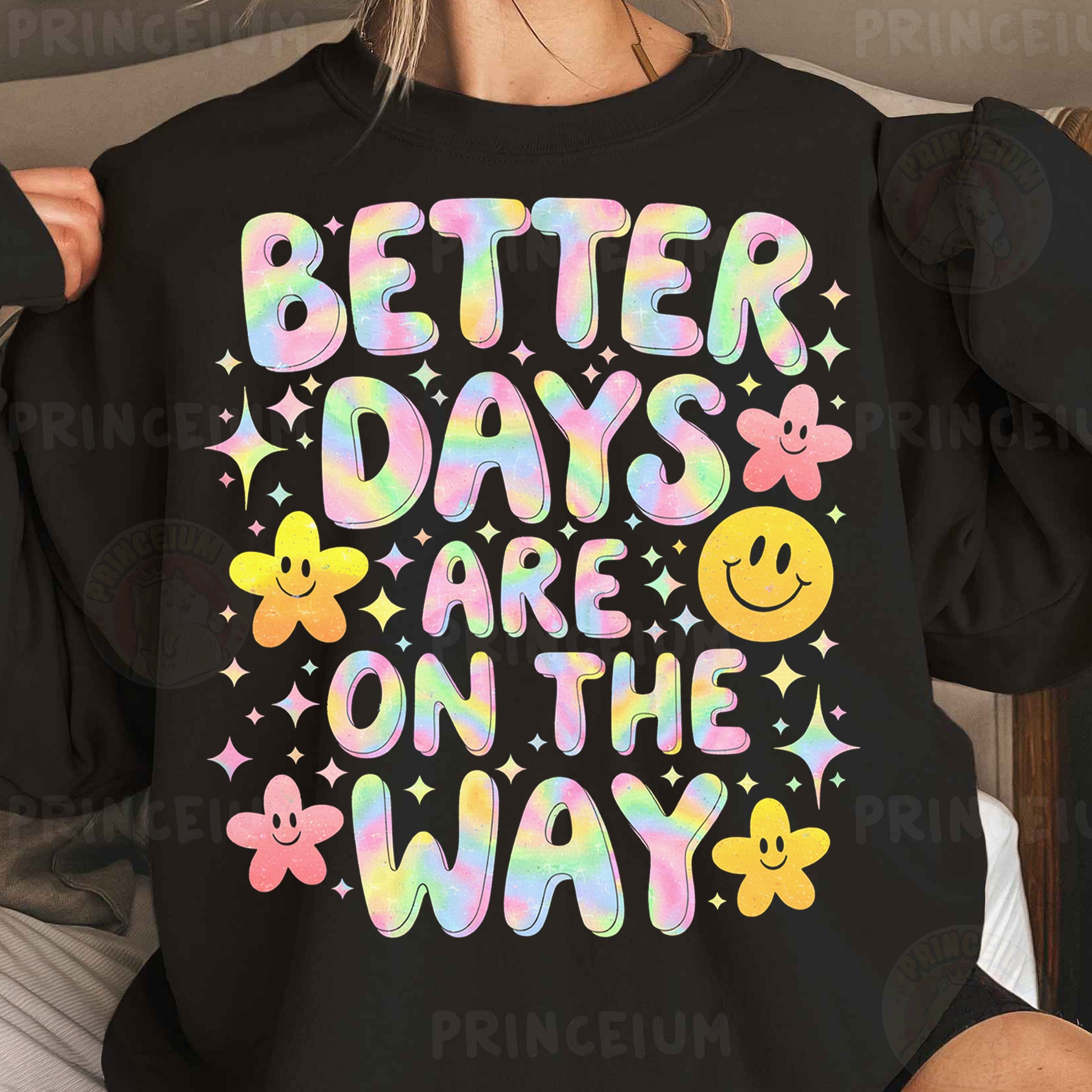 a woman wearing a black sweatshirt that says better days are on the way