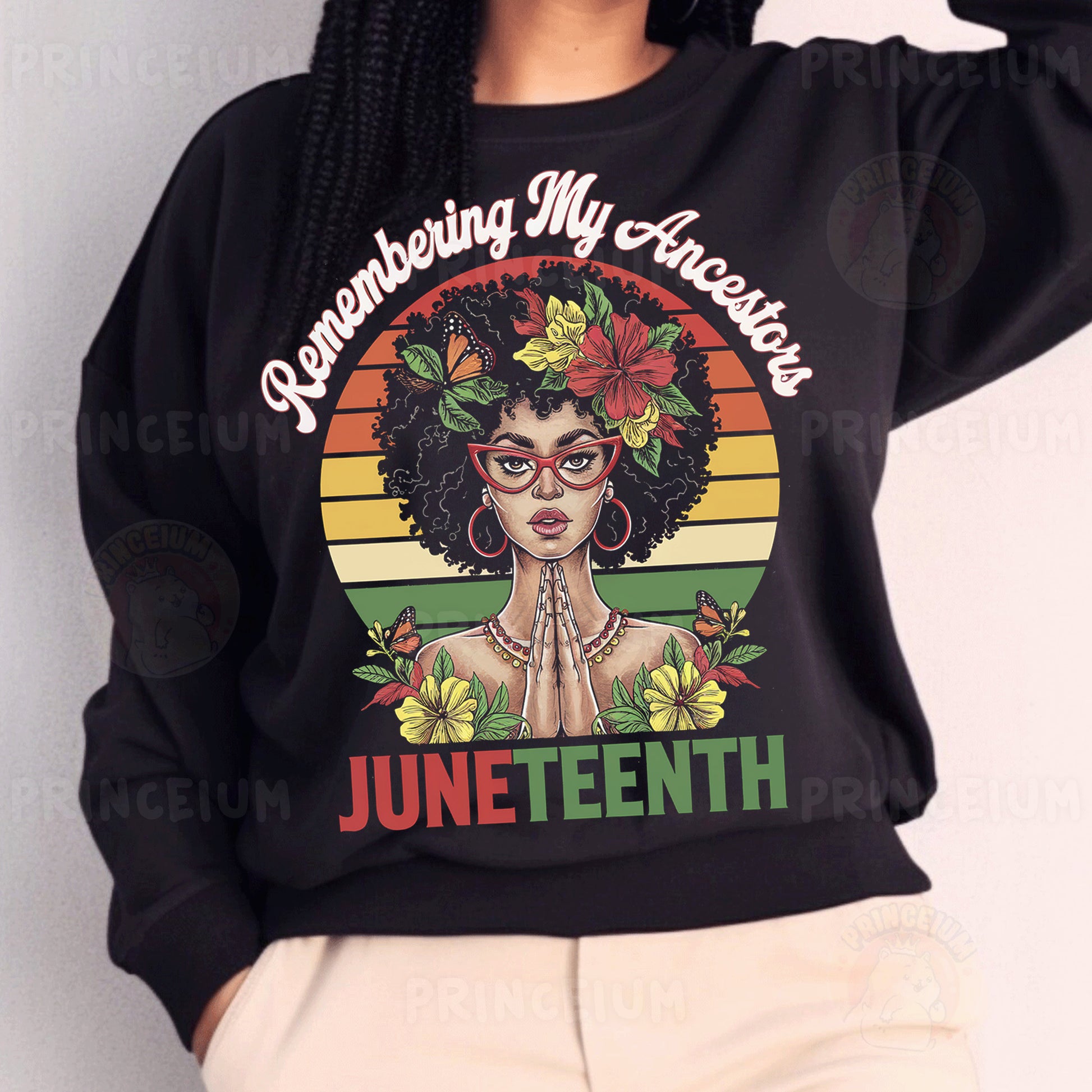 a woman wearing a black sweatshirt with a picture of a woman on it