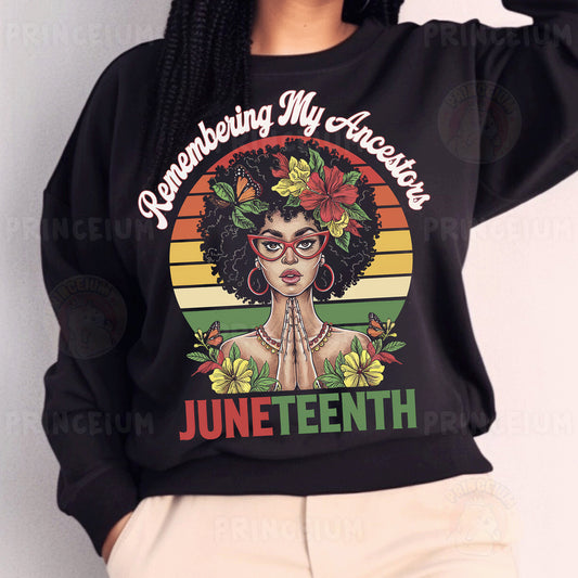a woman wearing a black sweatshirt with a picture of a woman on it