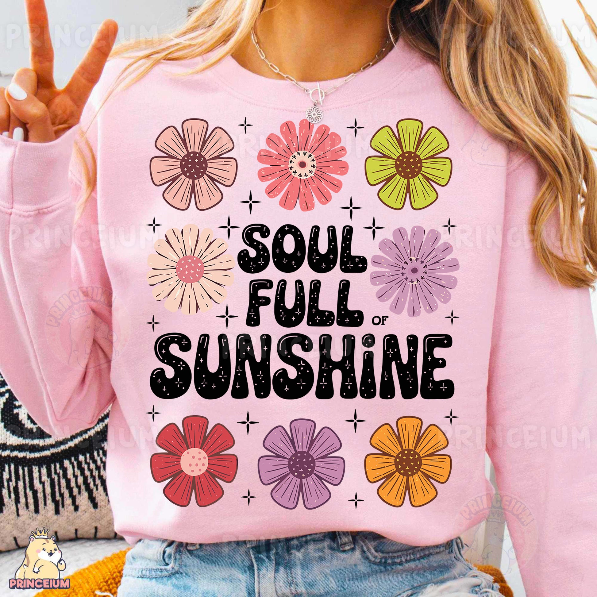 a woman wearing a pink sweatshirt that says soul full of sunshine