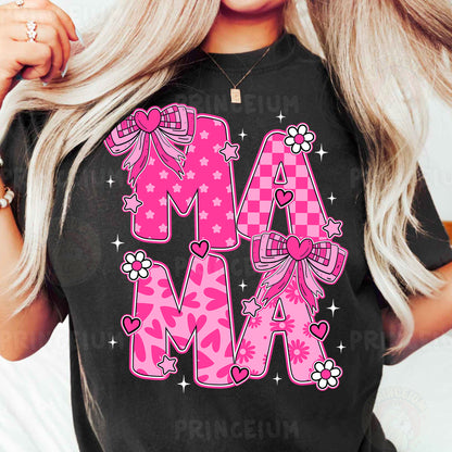 a woman wearing a black shirt with pink letters and bows