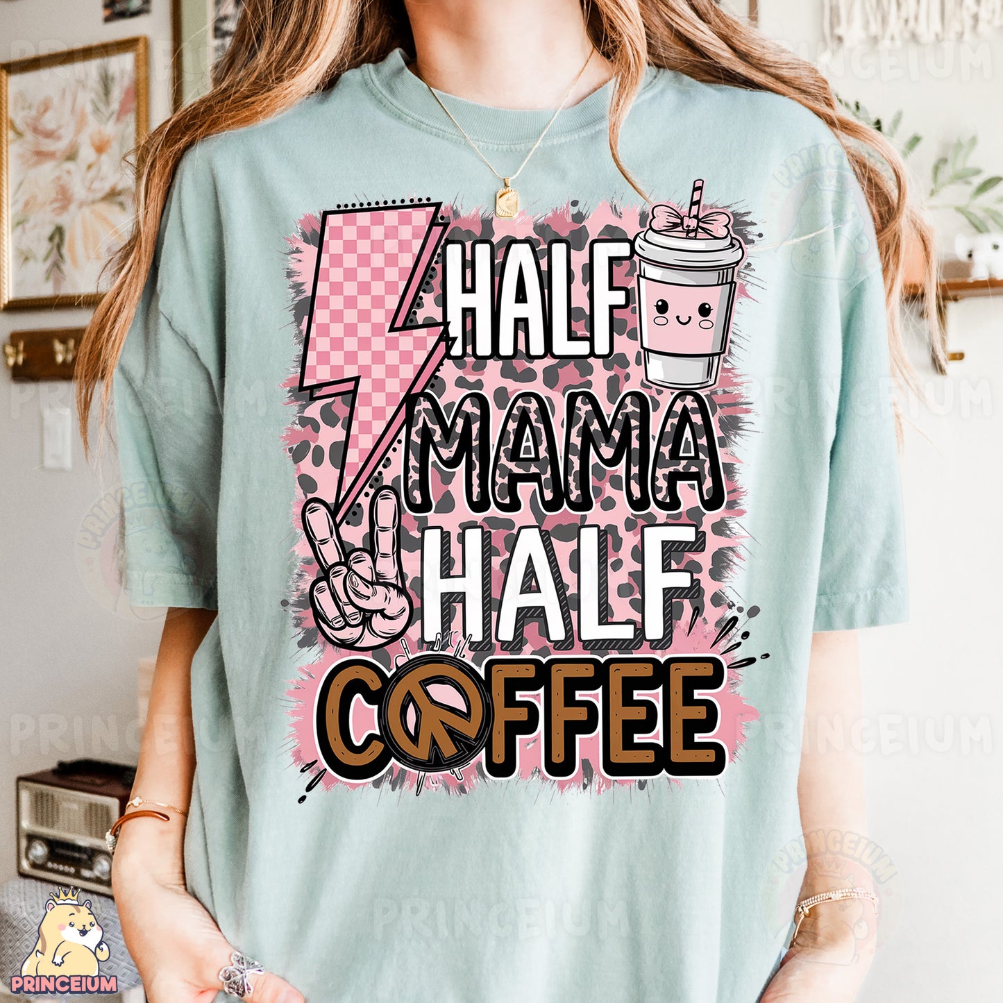 a woman wearing a t - shirt that says half mama half coffee