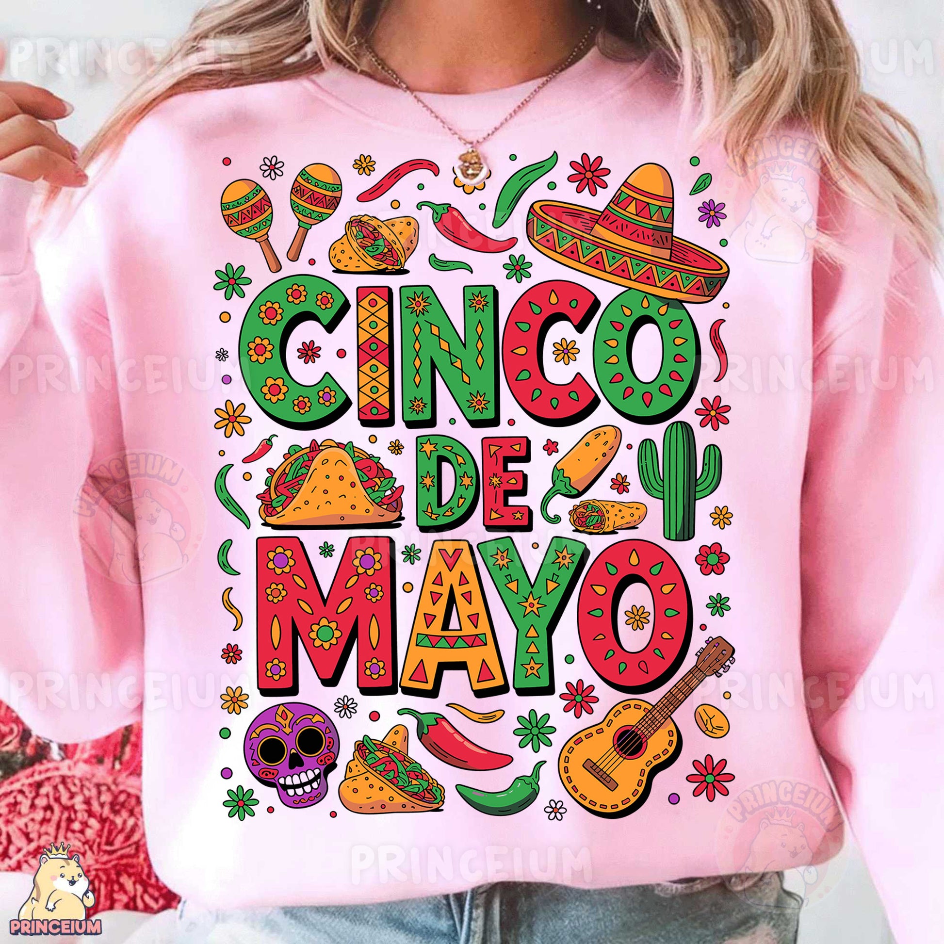 a woman wearing a pink cinco de mayo sweatshirt