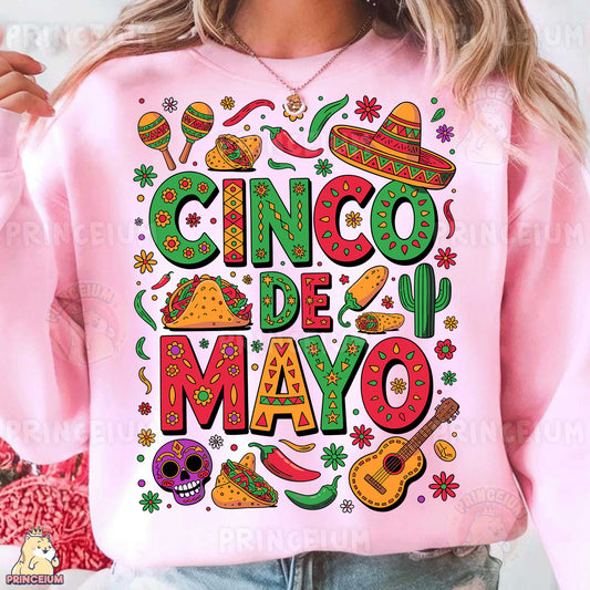 a woman wearing a pink cinco de mayo sweatshirt