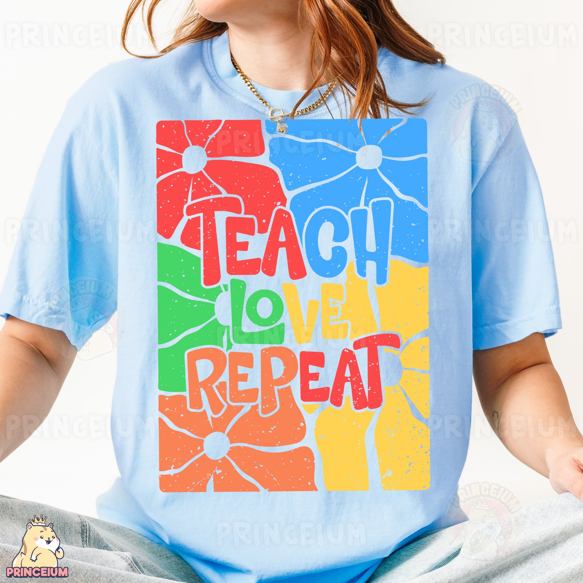 a woman sitting on the ground wearing a t - shirt with the words teach love