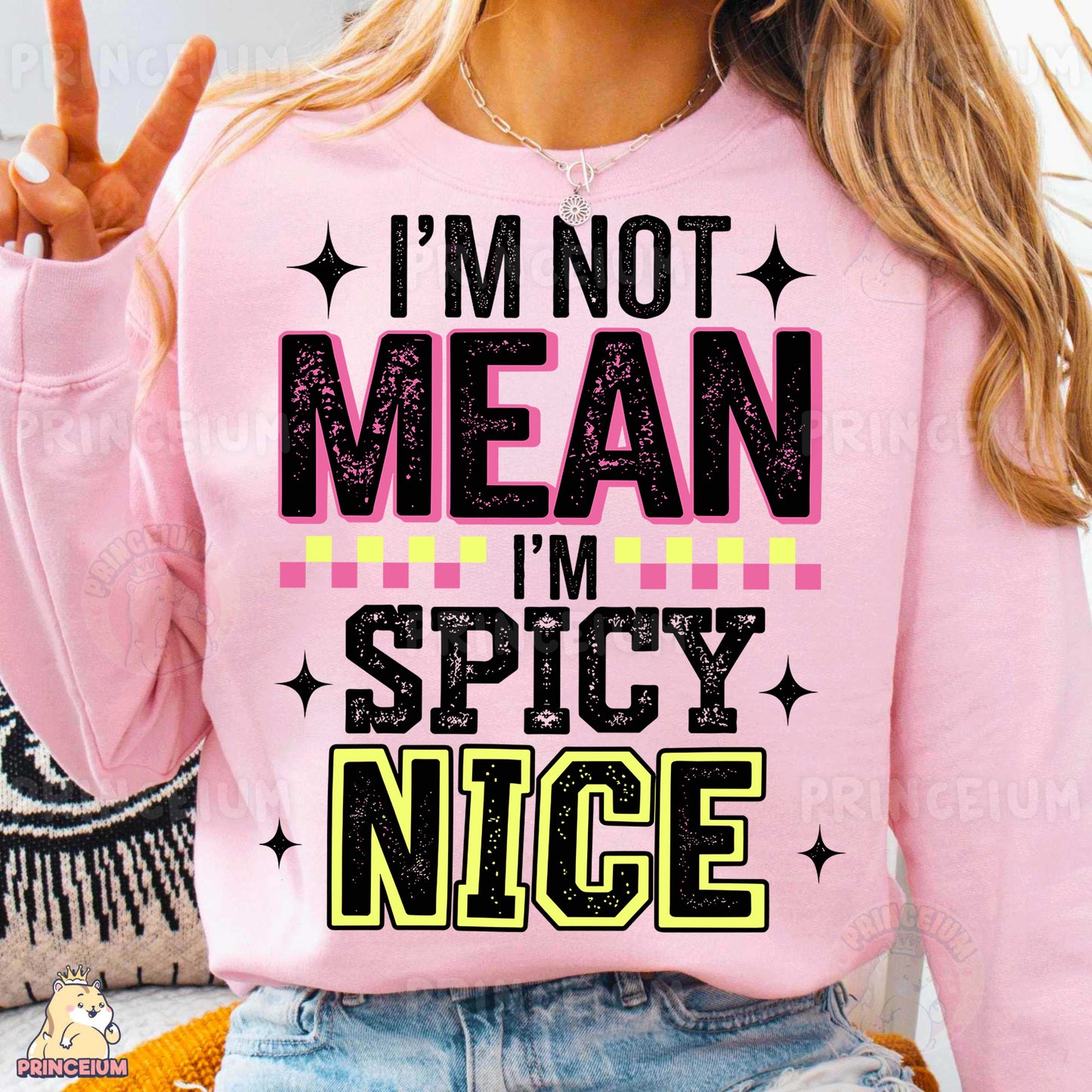 a woman wearing a pink shirt that says i'm not mean i'm