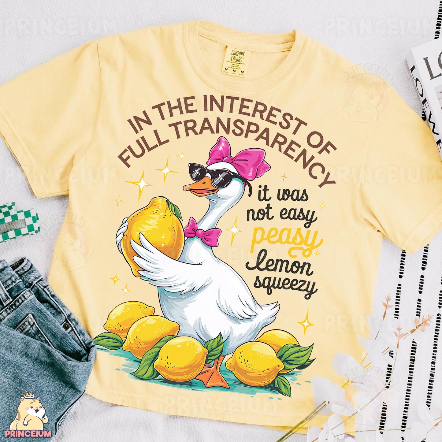 a t - shirt with a duck wearing sunglasses and a bow