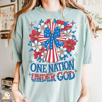 a woman wearing a one nation under god t - shirt