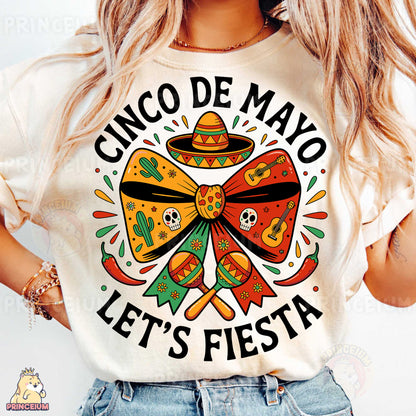 a woman wearing a cinco de mayo let's fiesta shirt