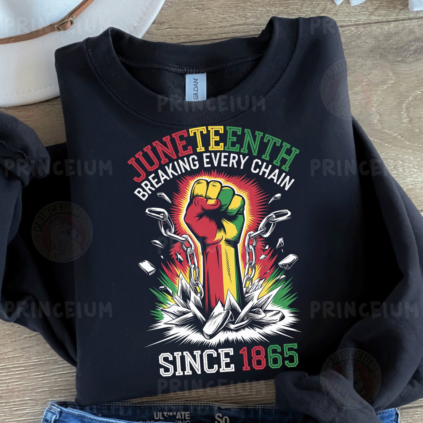 a black t - shirt with the words juneteeth breaking every chain since 1876