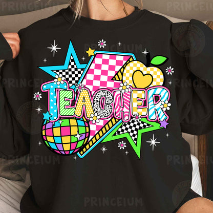 a woman wearing a black teacher shirt with a checkerboard design
