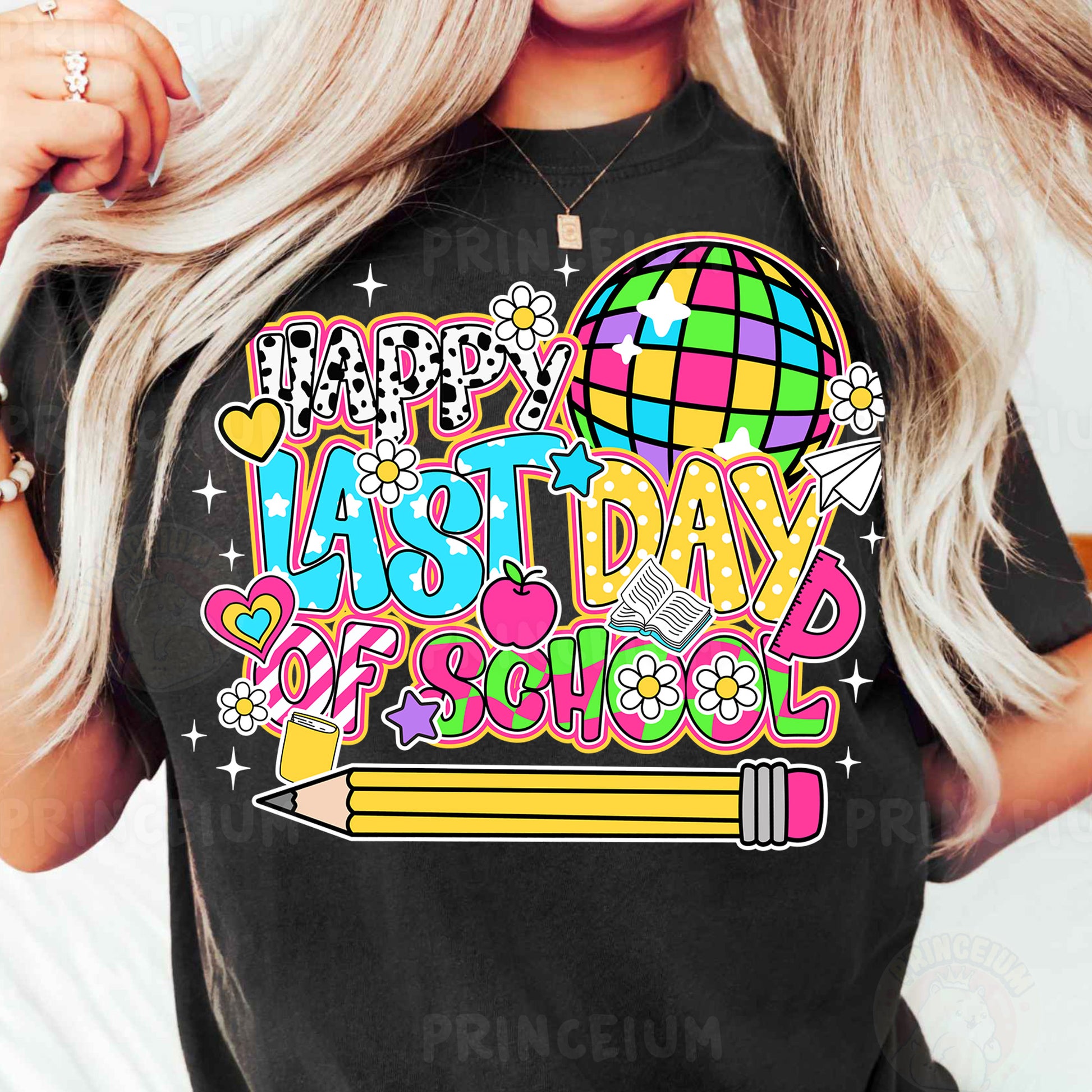 a woman wearing a black t - shirt that says happy last day of school