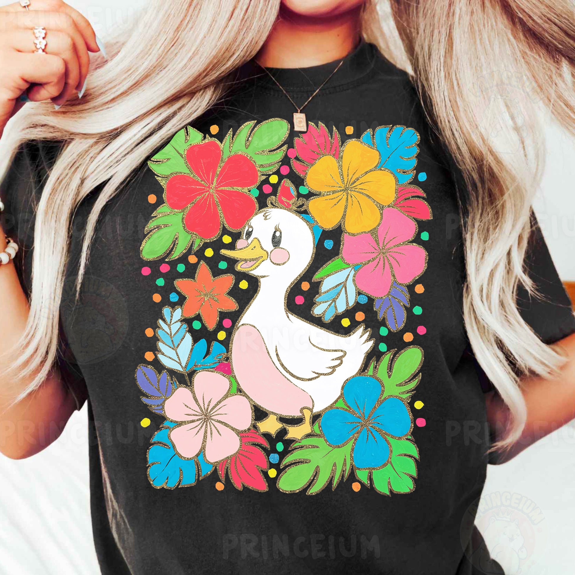a woman wearing a black shirt with a duck and flowers on it