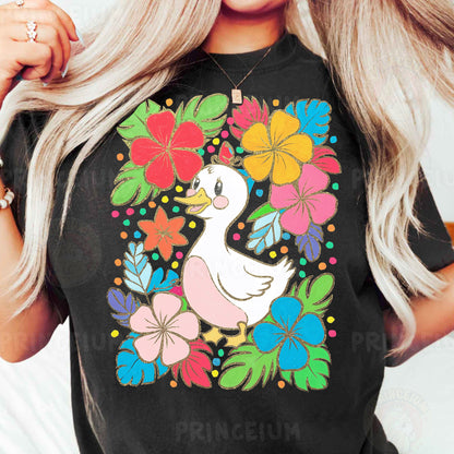 a woman wearing a black shirt with a duck and flowers on it