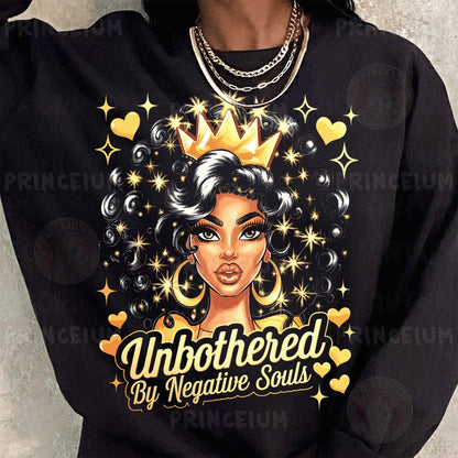 a woman wearing a black sweatshirt with a crown on her head