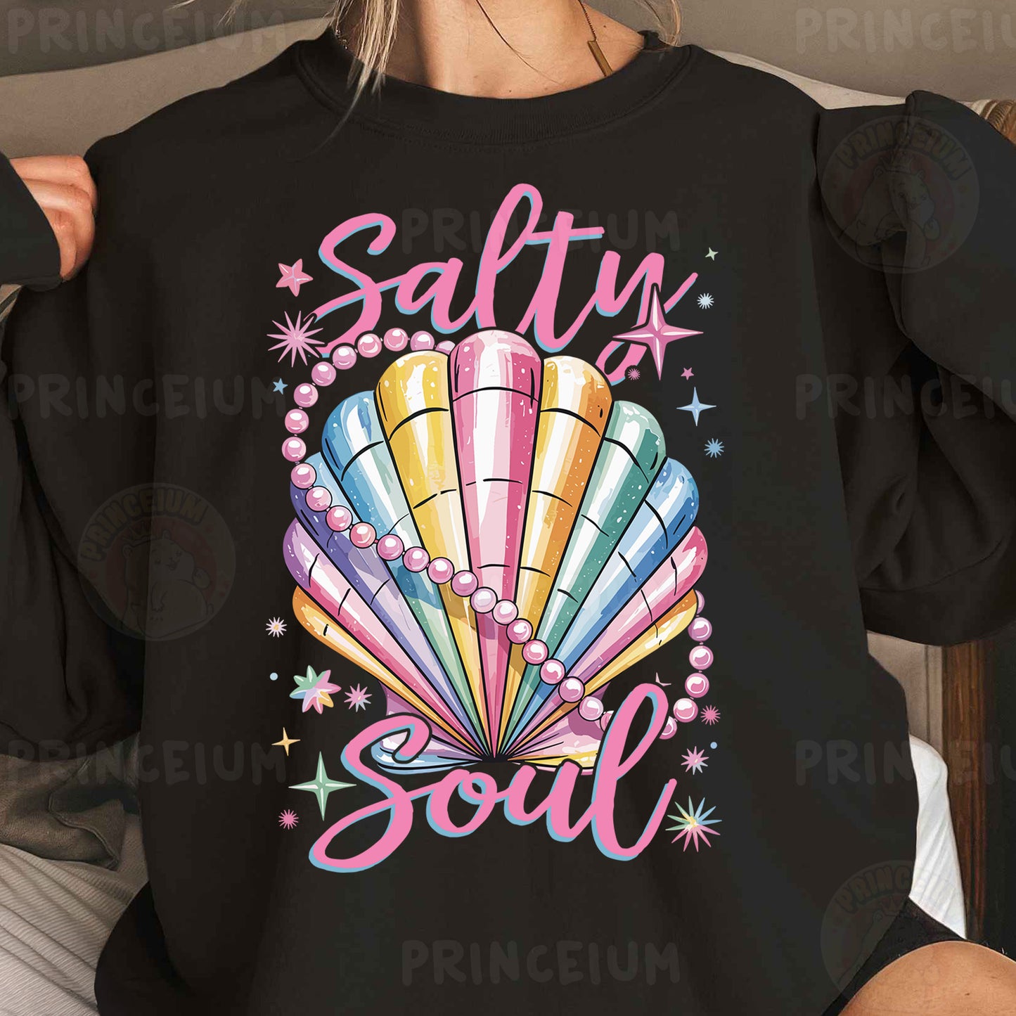 a woman wearing a black shirt that says salty soul