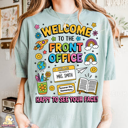a woman wearing a t - shirt that says, welcome to the front office happy