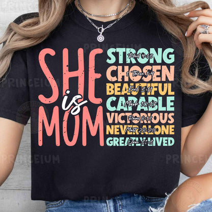 a woman wearing a black shirt that says she is a mom
