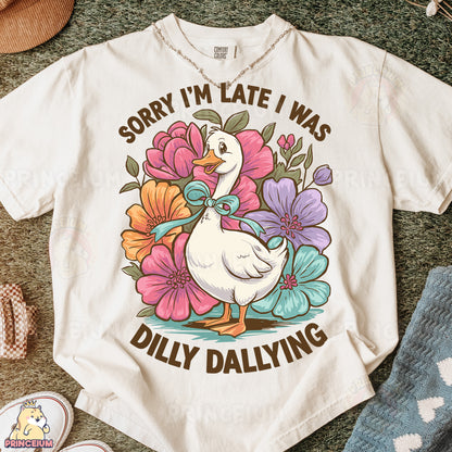 a white t - shirt with a duck and flowers on it