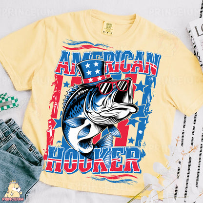 a t - shirt with a fish on it next to a pair of jeans