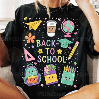 a woman sitting on a couch wearing a black back to school shirt