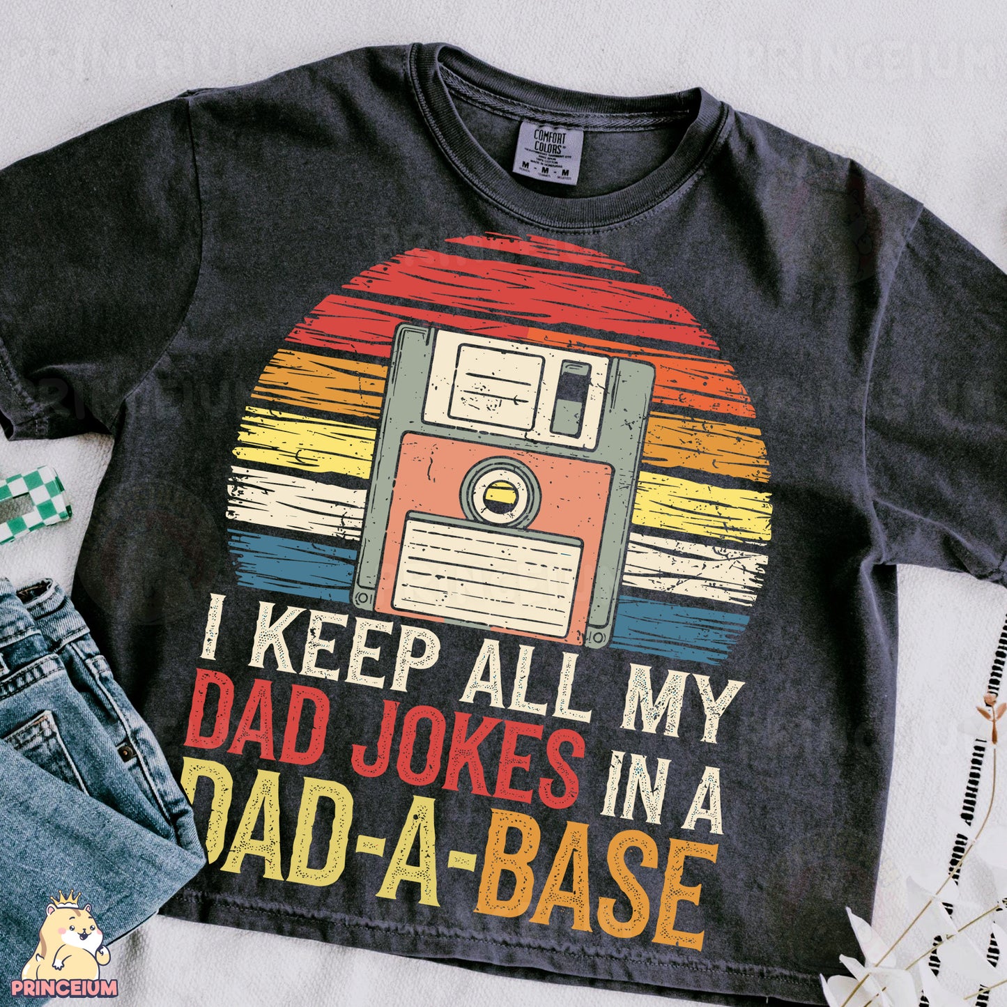 a t - shirt that says i keep all my dad jokes in a dad -
