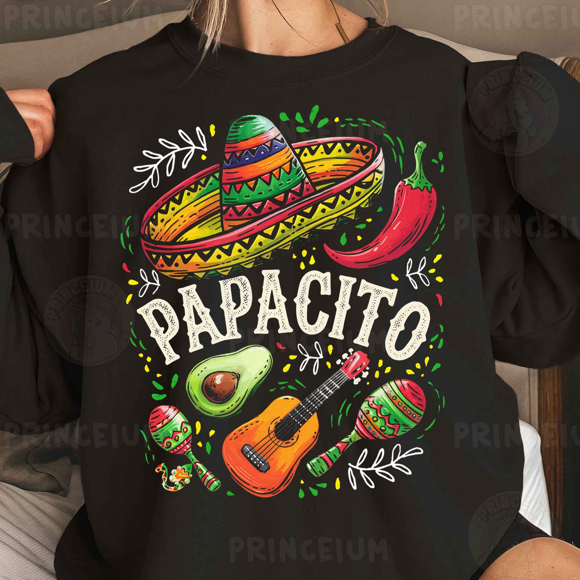 a woman wearing a black sweatshirt with a mexican design