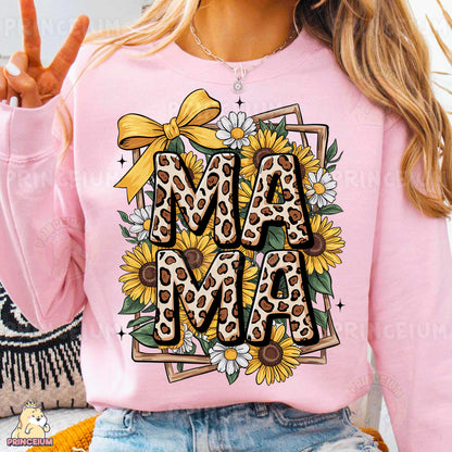 a woman wearing a pink shirt with the word ma ma on it