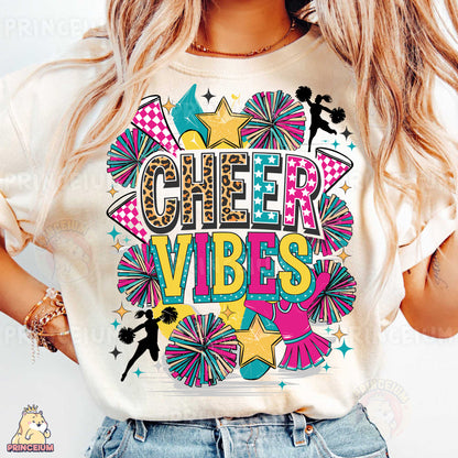 a woman wearing a cheer vibes t - shirt