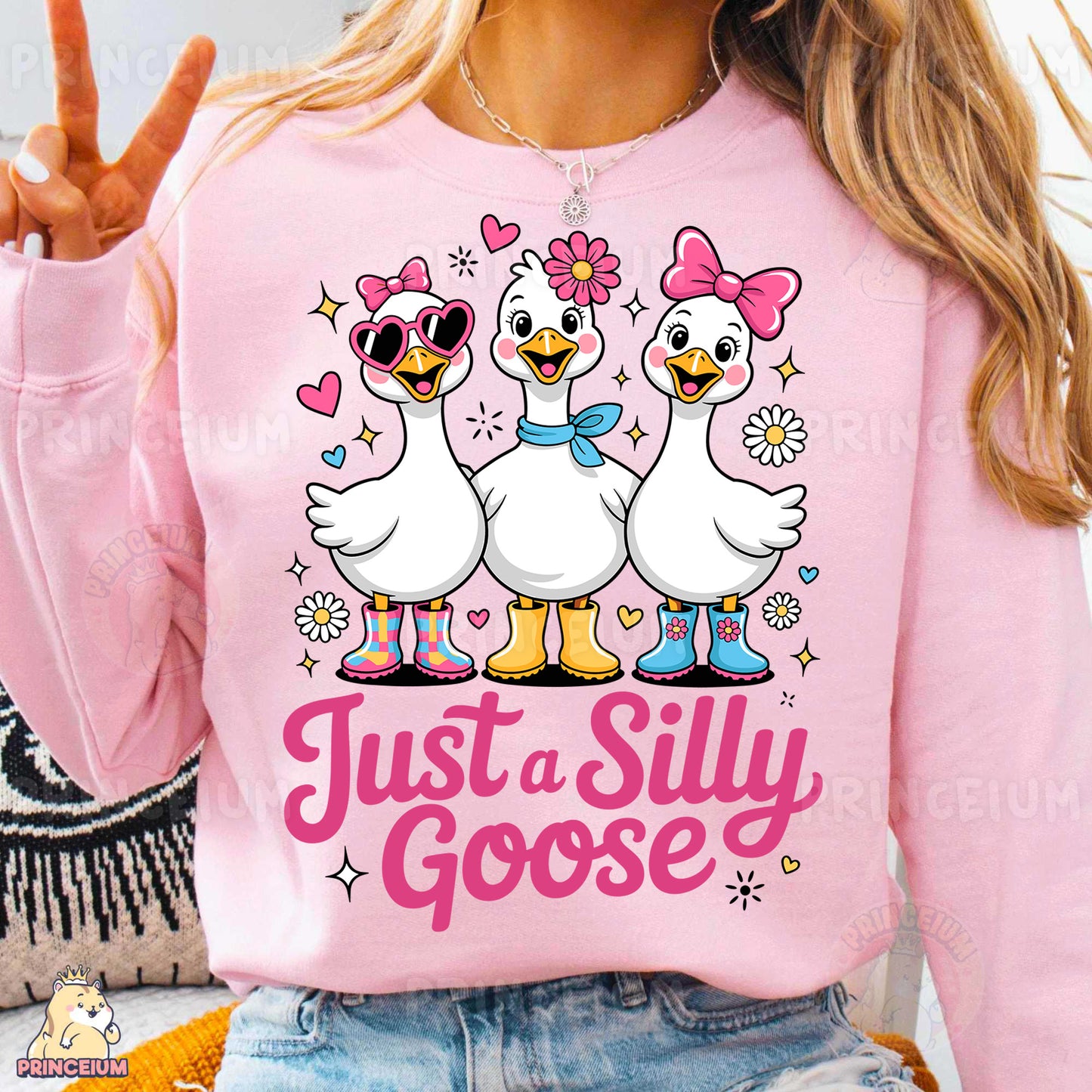a woman wearing a pink shirt that says just a silly goose