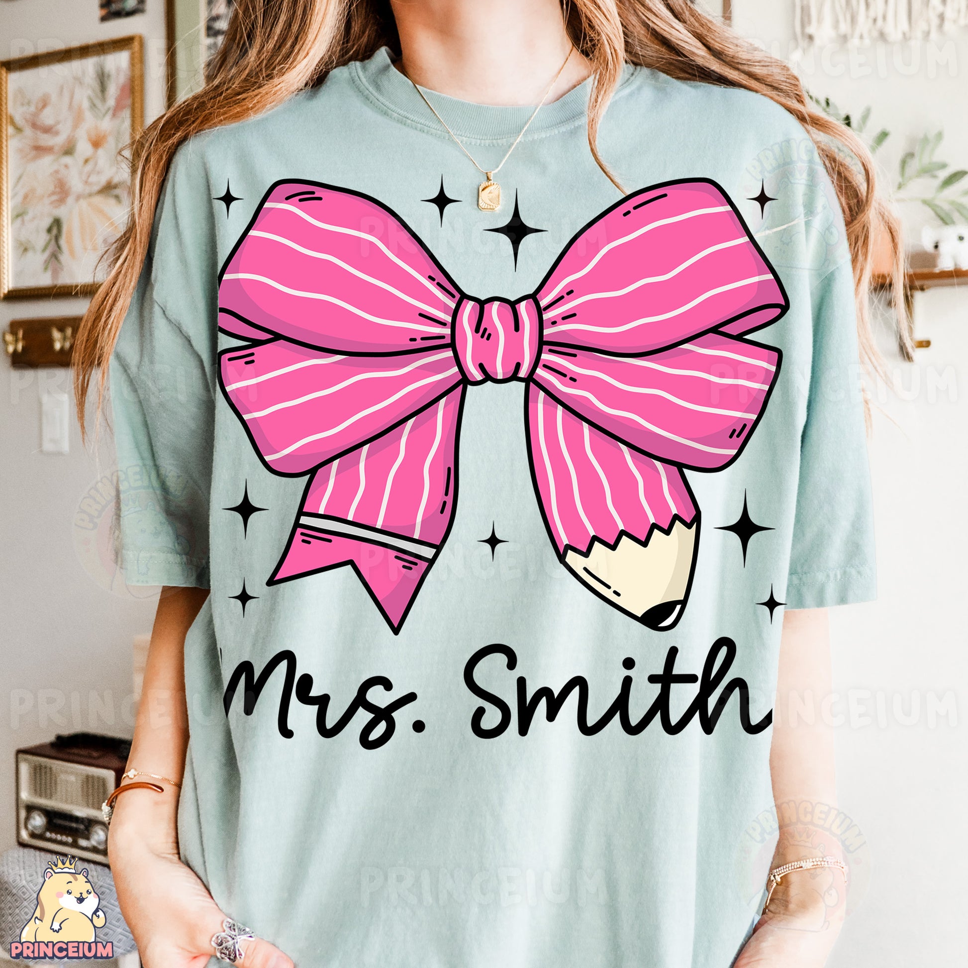 a woman wearing a t - shirt with a pink bow on it