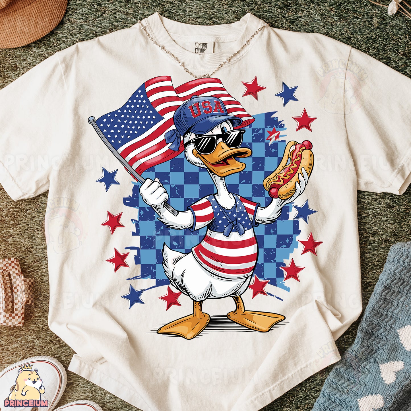 a t - shirt with a duck holding a hot dog and an american flag