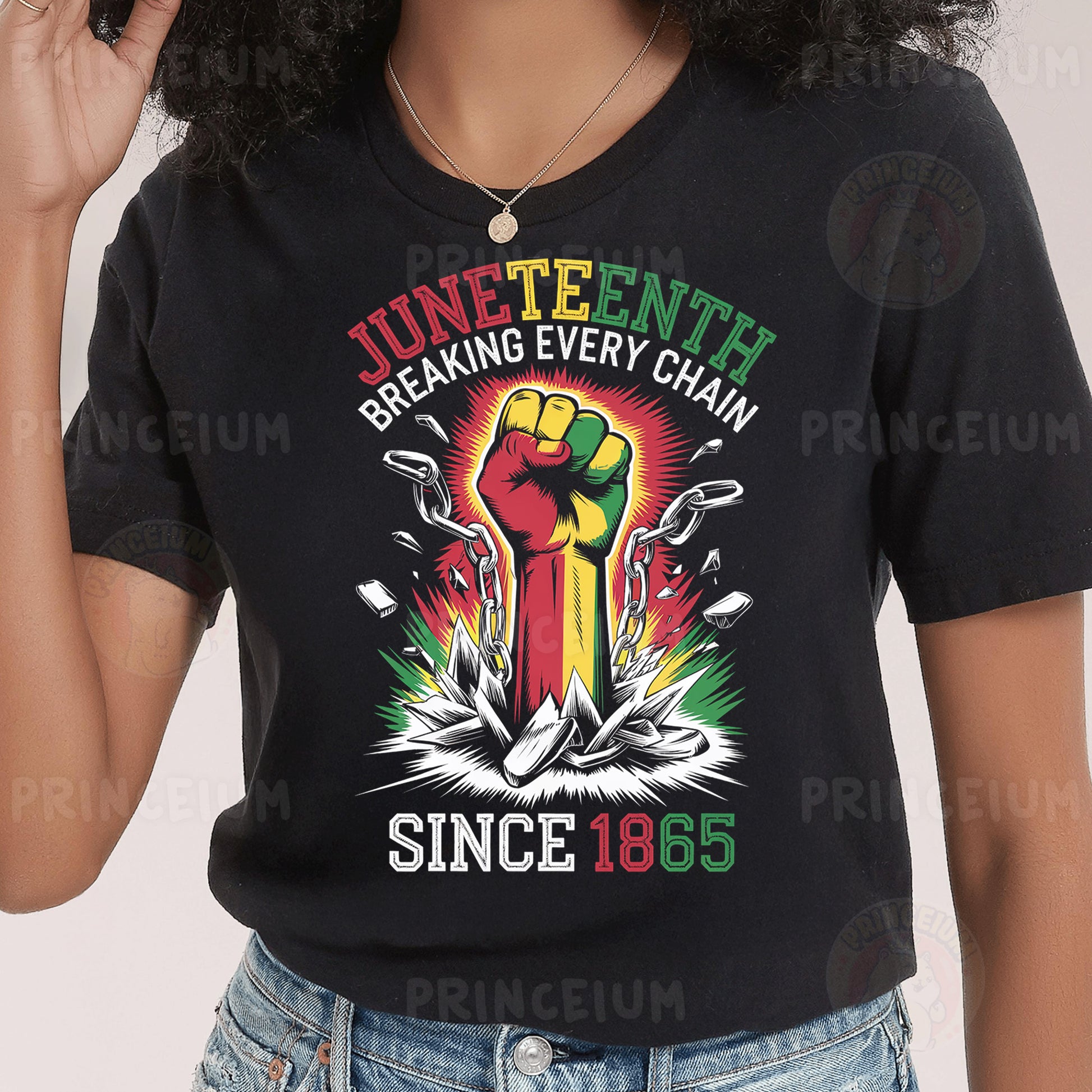 a woman wearing a black shirt with a fist on it