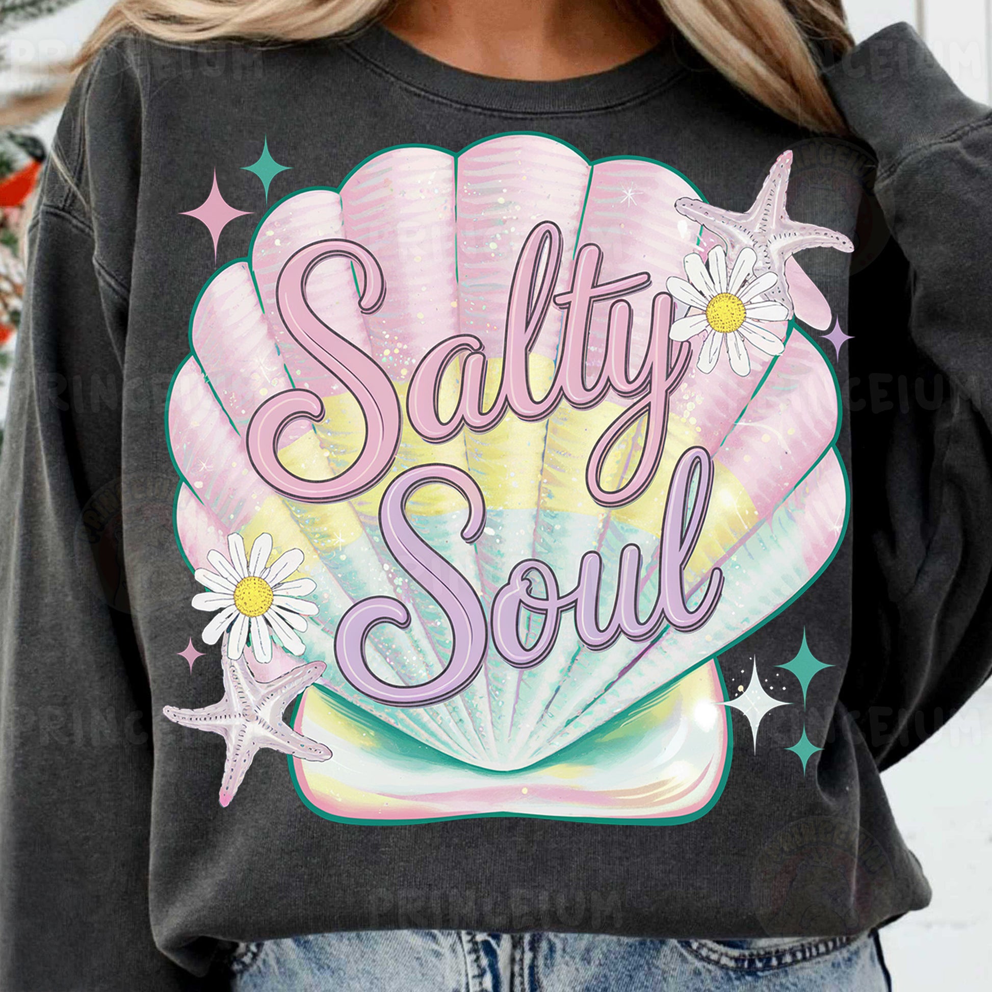 a woman wearing a sweatshirt that says salty soul