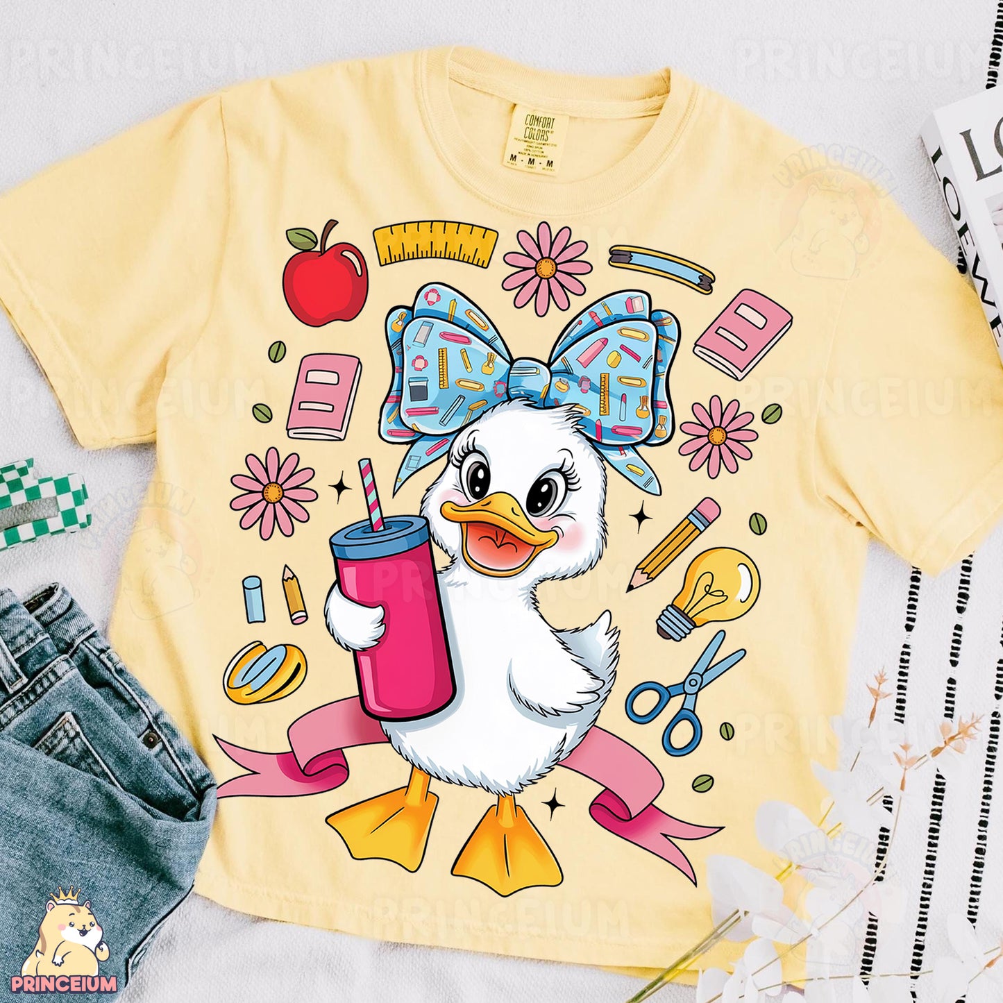 a yellow shirt with a duck holding a cup