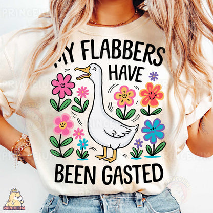a woman wearing a t - shirt that says, my flabbers have been