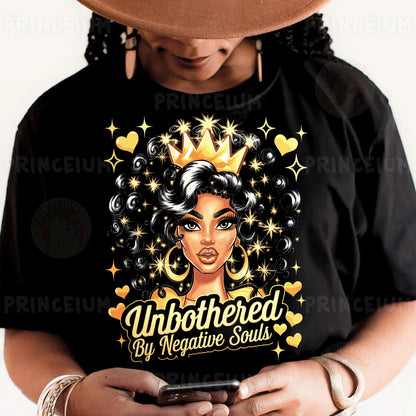 a woman wearing a black shirt with a crown on her head